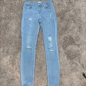 Distressed light wash jeans